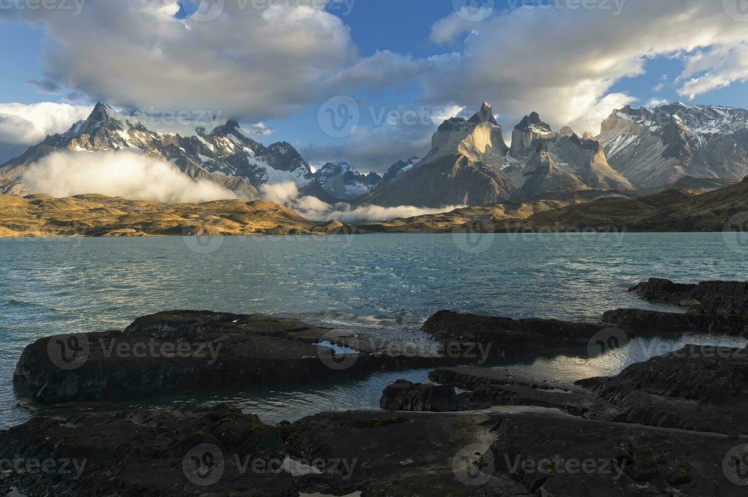 Sunrise over Cuernos del Paine, Torres del Paine National Park and Lake Pehoe, Chilean Patagonia, Chile photo