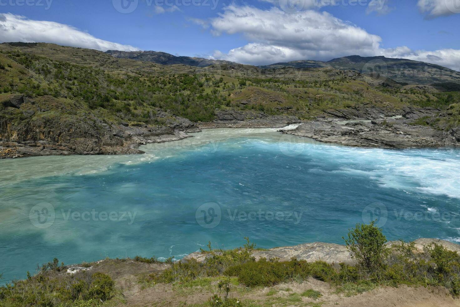 Rapids at the confluence of blue Baker river and grey Neff river, Pan-American Highway between Cochrane and Puerto Guadal, Aysen Region, Patagonia, Chile photo