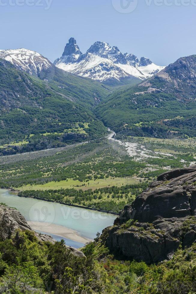 Castillo mountain range and Ibanez river wide valley viewed from the Pan-American Highway, Aysen Region, Patagonia, Chile photo