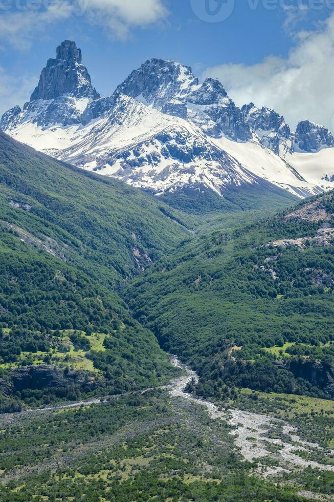 Castillo mountain range and Ibanez river wide valley viewed from the Pan-American Highway, Aysen Region, Patagonia, Chile photo