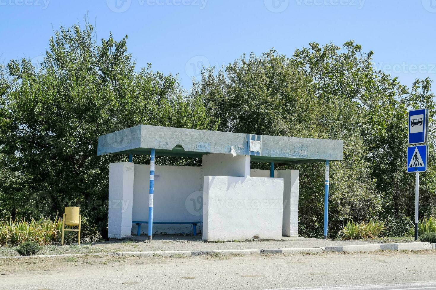 Bus stop in the countryside. Rural landscape. photo