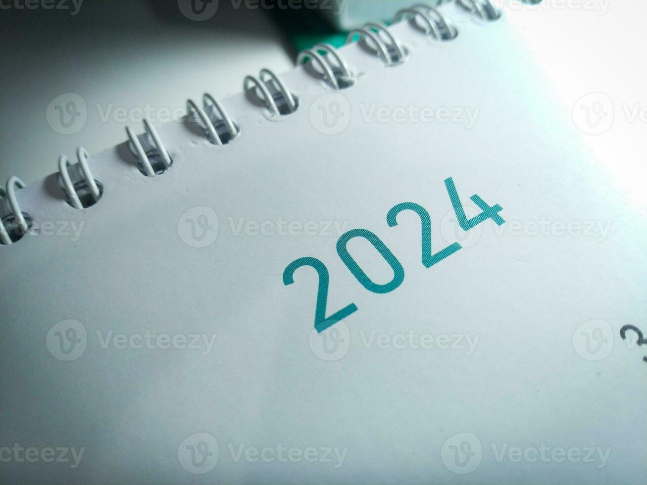 un cerca arriba de 2024 en calendario foto