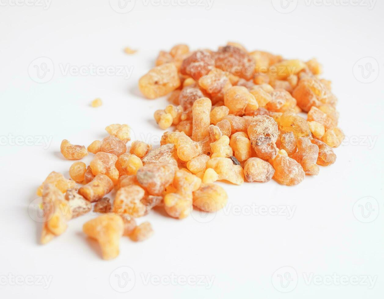 Frankincense or olibanum aromatic resin isolated on white background used in incense and perfumes. photo