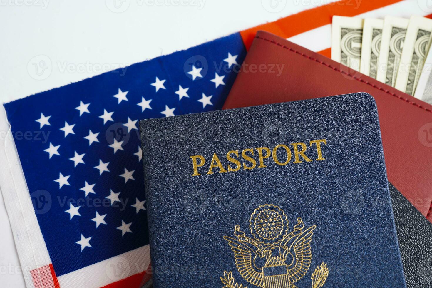 US passport on USA flag, American citizen in United States of America. photo