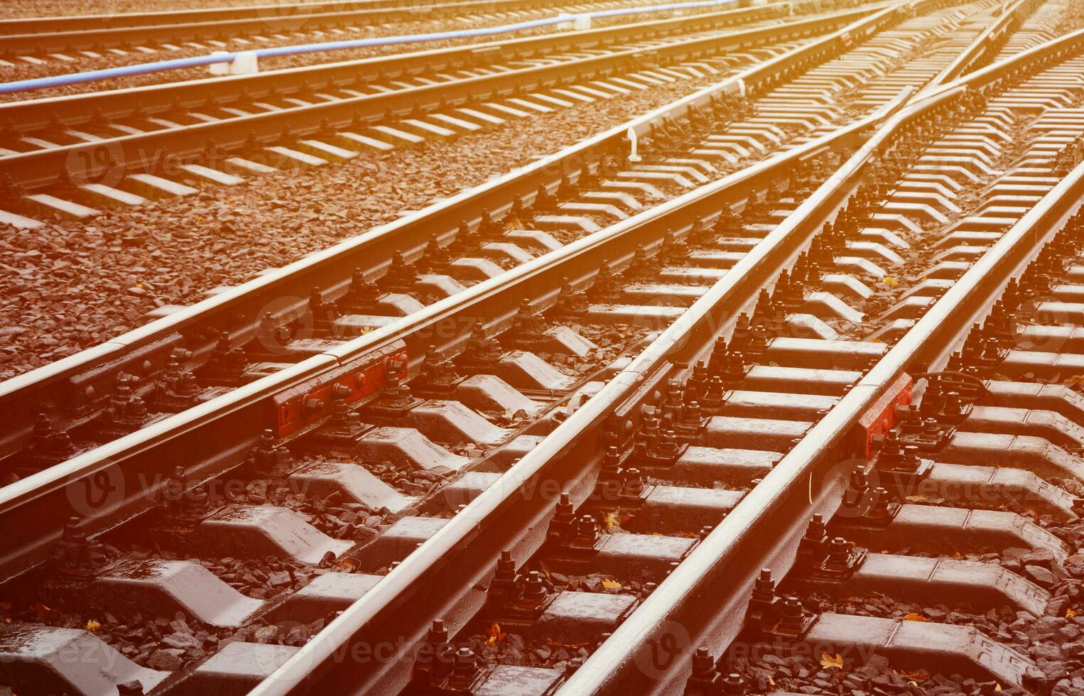 Photo fragment of the railroad tracks in the rainy weather