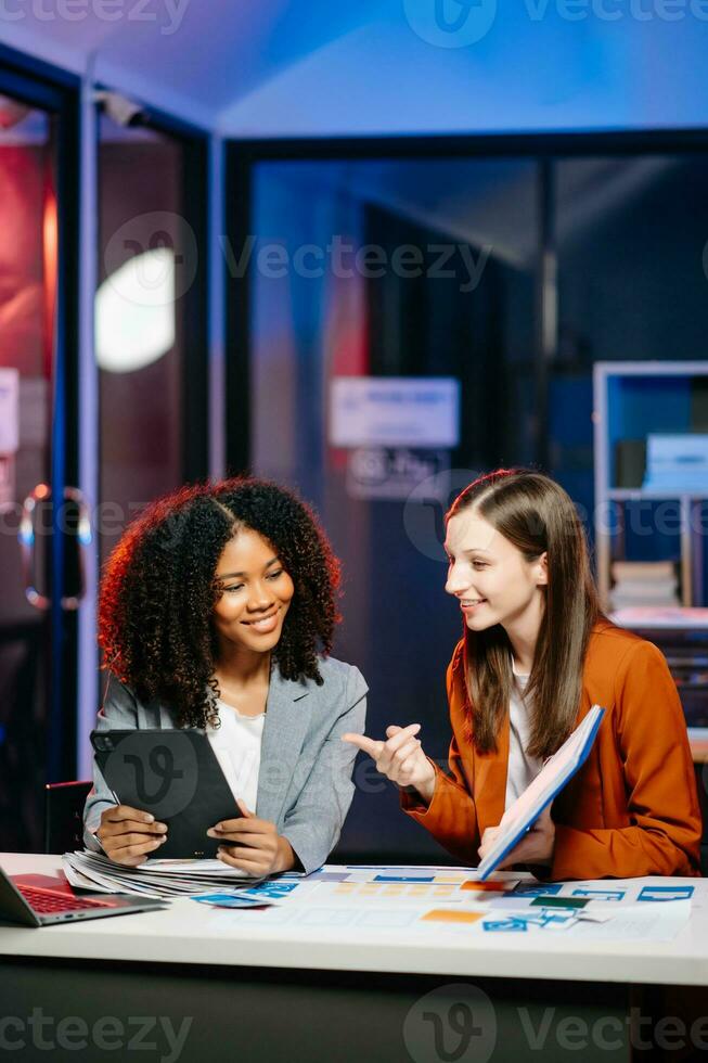 UX developer and ui designer brainstorming about mobile app interface wireframe design with customer breif and color code photo
