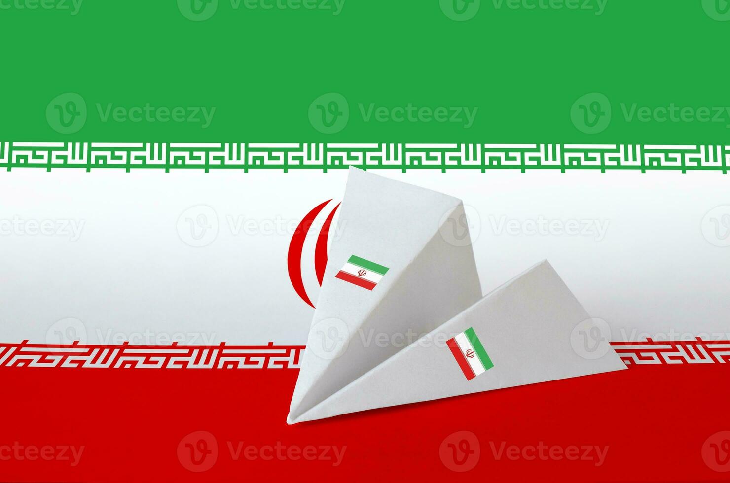 Iran flag depicted on paper origami airplane. Handmade arts concept photo