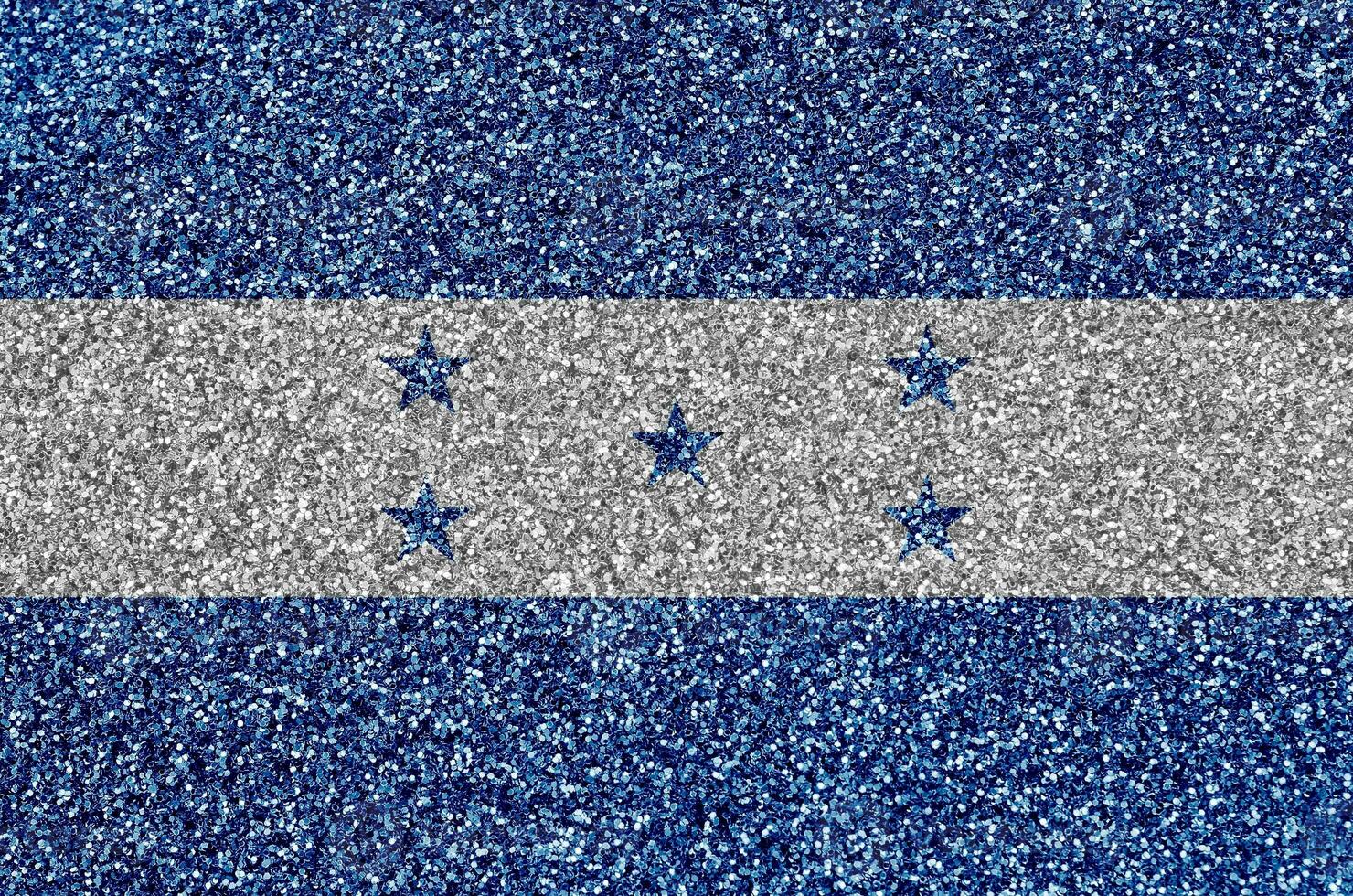 Honduras flag depicted on many small shiny sequins. Colorful festival background for party photo