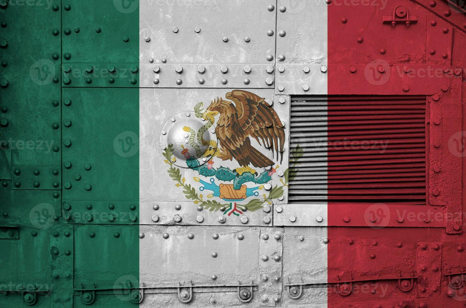 Mexico flag depicted on side part of military armored tank closeup. Army forces conceptual background photo