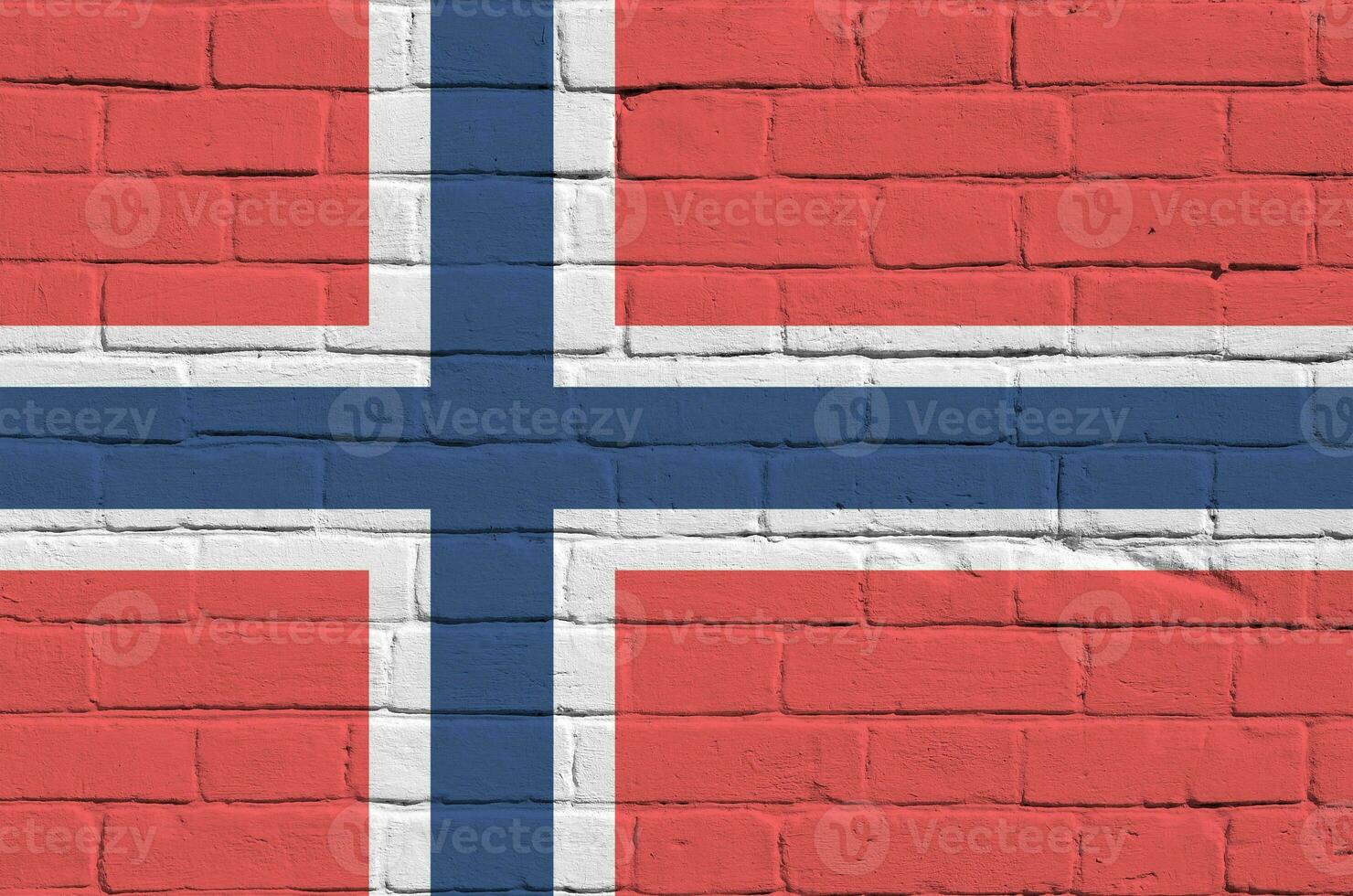 Norway flag depicted in paint colors on old brick wall. Textured banner on big brick wall masonry background photo
