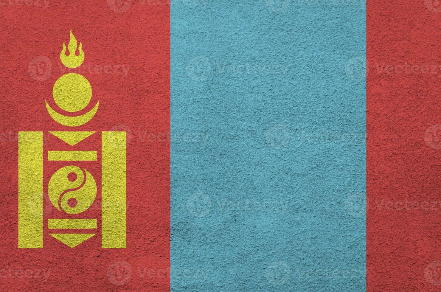 Mongolia flag depicted in bright paint colors on old relief plastering wall. Textured banner on rough background photo
