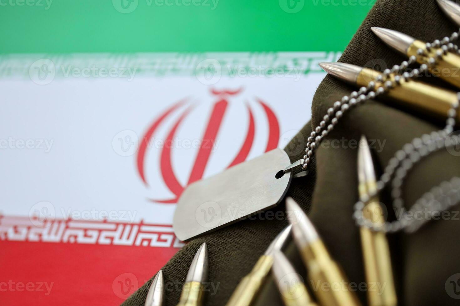 Many rifle bullets and dog tags with flag of Islamic Republic of Iran. The concept assault and terrorism photo