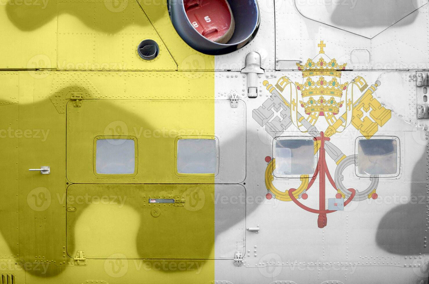 Vatican City State flag depicted on side part of military armored helicopter closeup. Army forces aircraft conceptual background photo