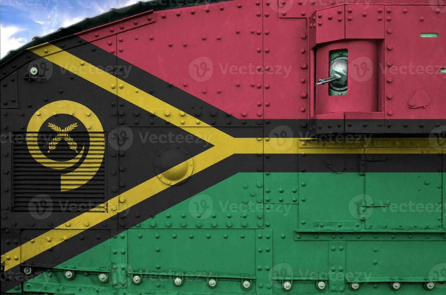 Vanuatu flag depicted on side part of military armored tank closeup. Army forces conceptual background photo