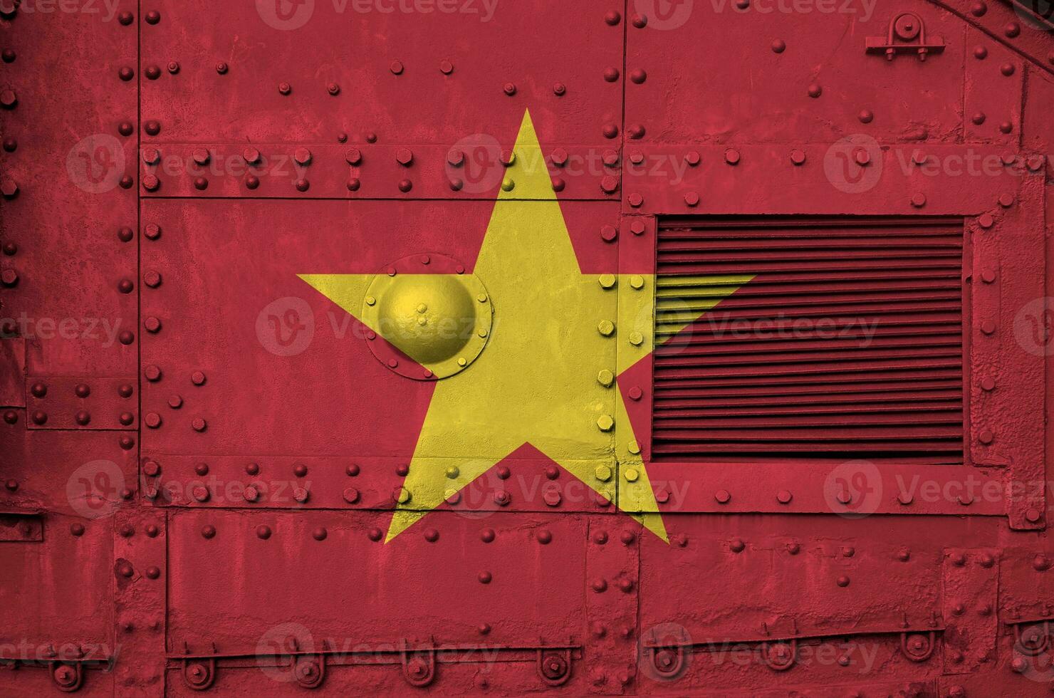 Vietnam flag depicted on side part of military armored tank closeup. Army forces conceptual background photo