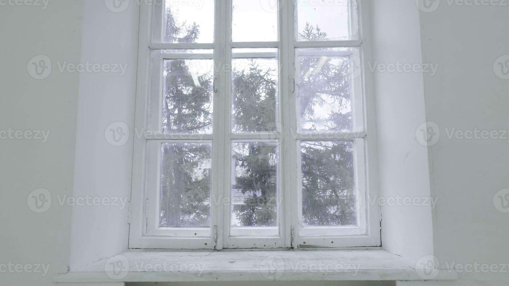 Blank white wall with window. Slide motion of movement or hitting the camera on empty light white room with window. Construction Home Empty room interior window aluminum on wall photo