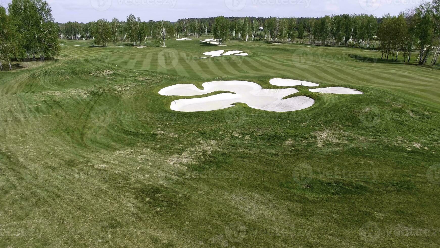 Aerial view Golf course. Sand bunkers at the beautiful golf course. photo