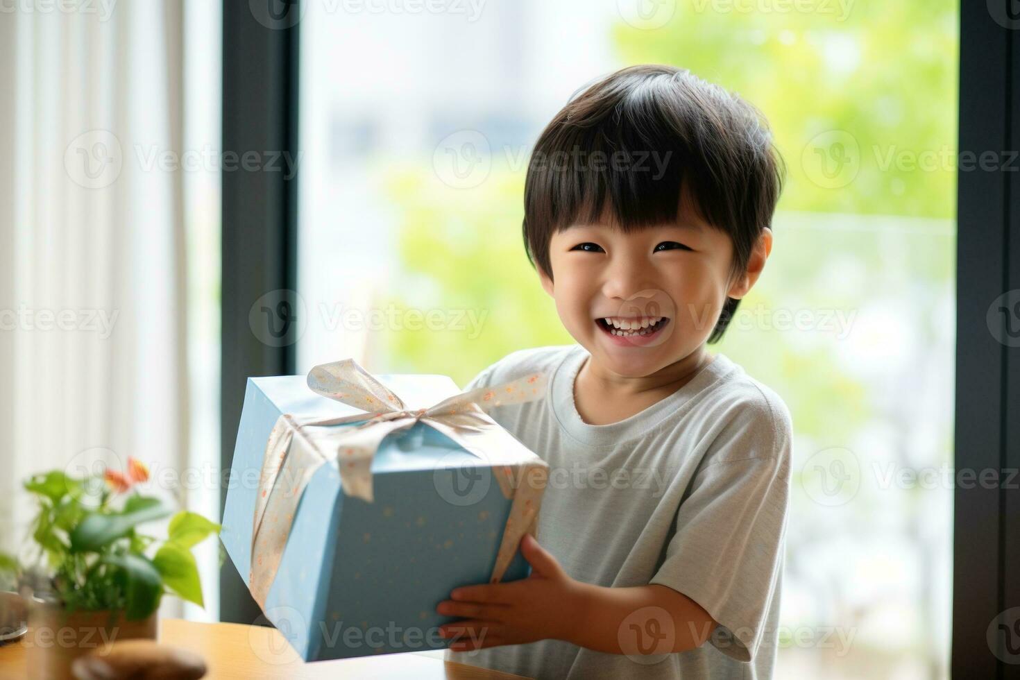 AI generated Cute asian little boy holding a gift box photo