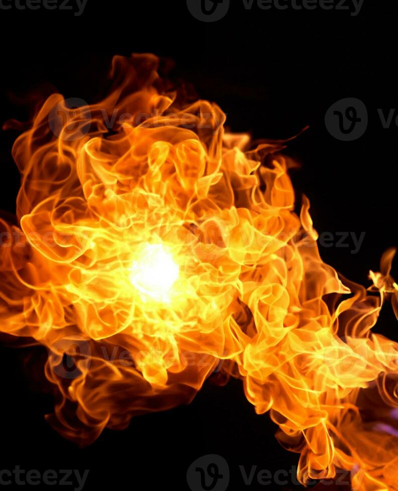 Fire flames on a black background photo