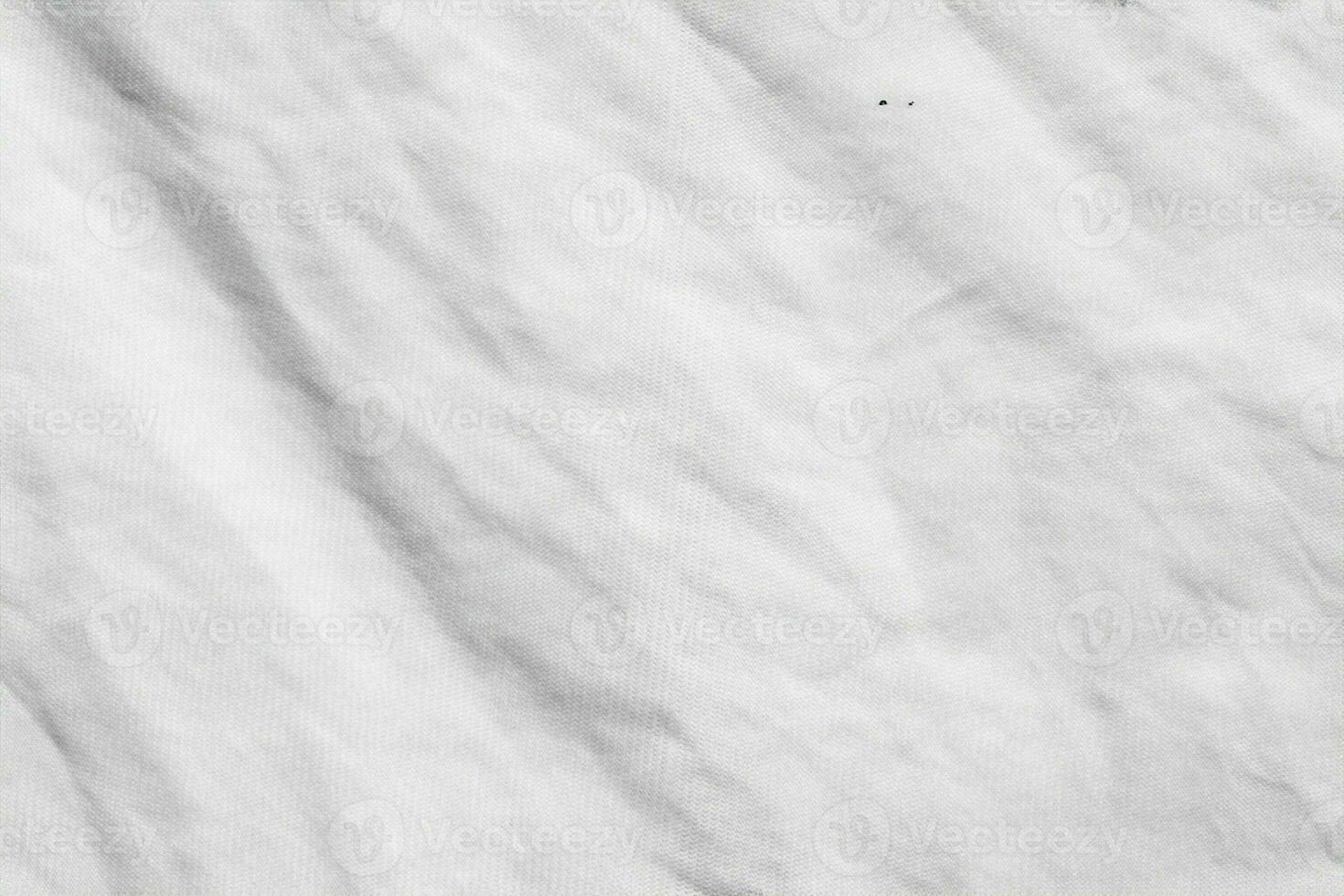 fondo de patrón de textura de tela de tela de camisa de algodón arrugado blanco foto