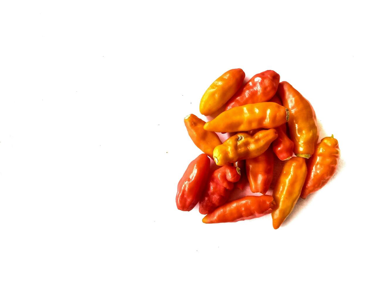 Chili pepper isolated. Chilli top view on white background. Whole and cut red hot chili peppers top. With clipping path. photo