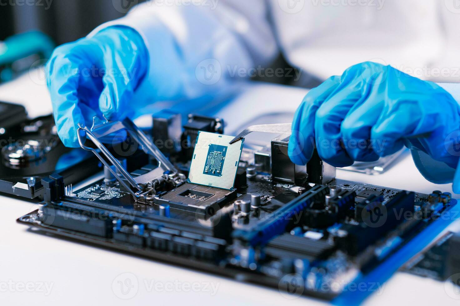 The technician repairing the motherboard in the lab with copy space. the concept of computer hardware, mobile phone, electronic, repairing, upgrade photo