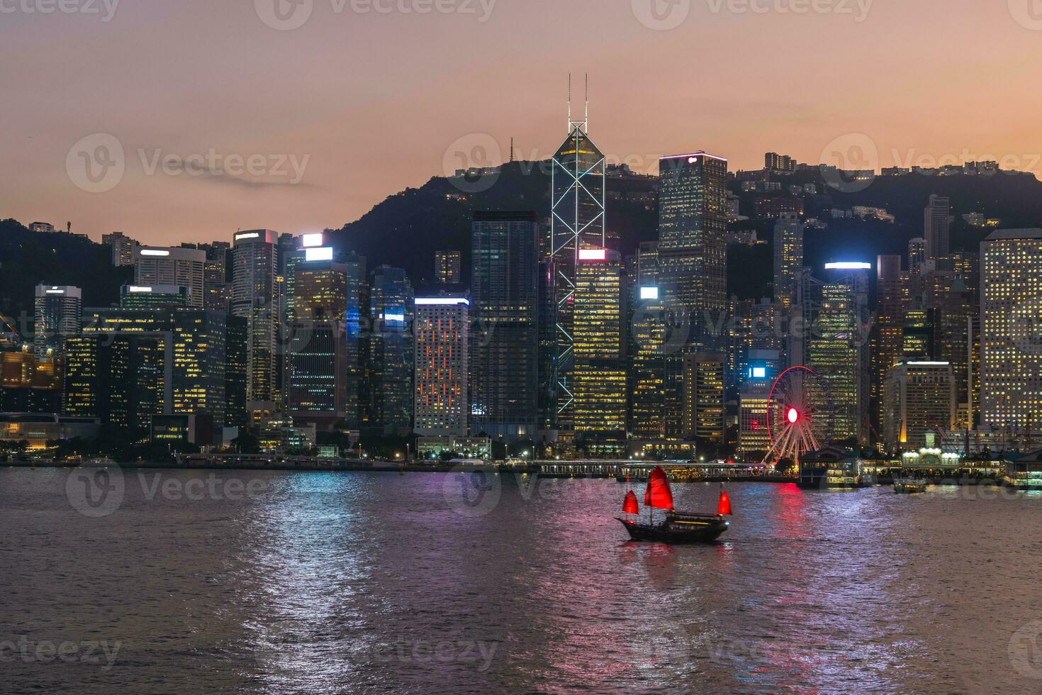 night view of victoria harbor and hongkong island in hong kong, China photo