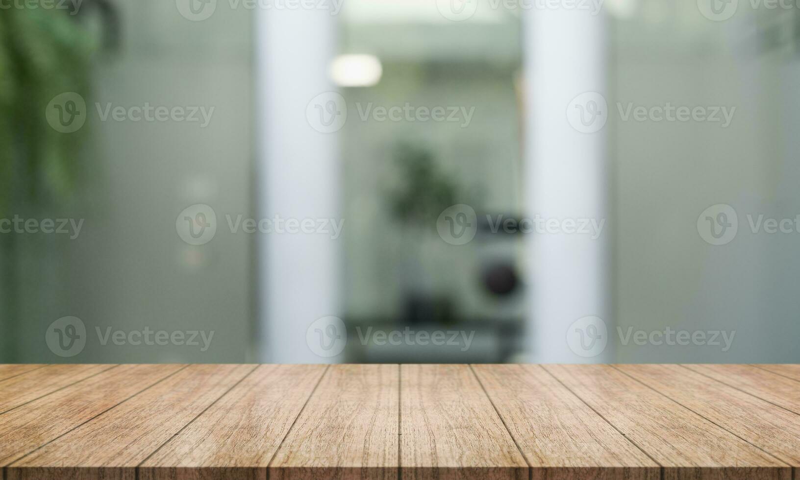 Empty wooden table top with lights bokeh on blur restaurant background. photo
