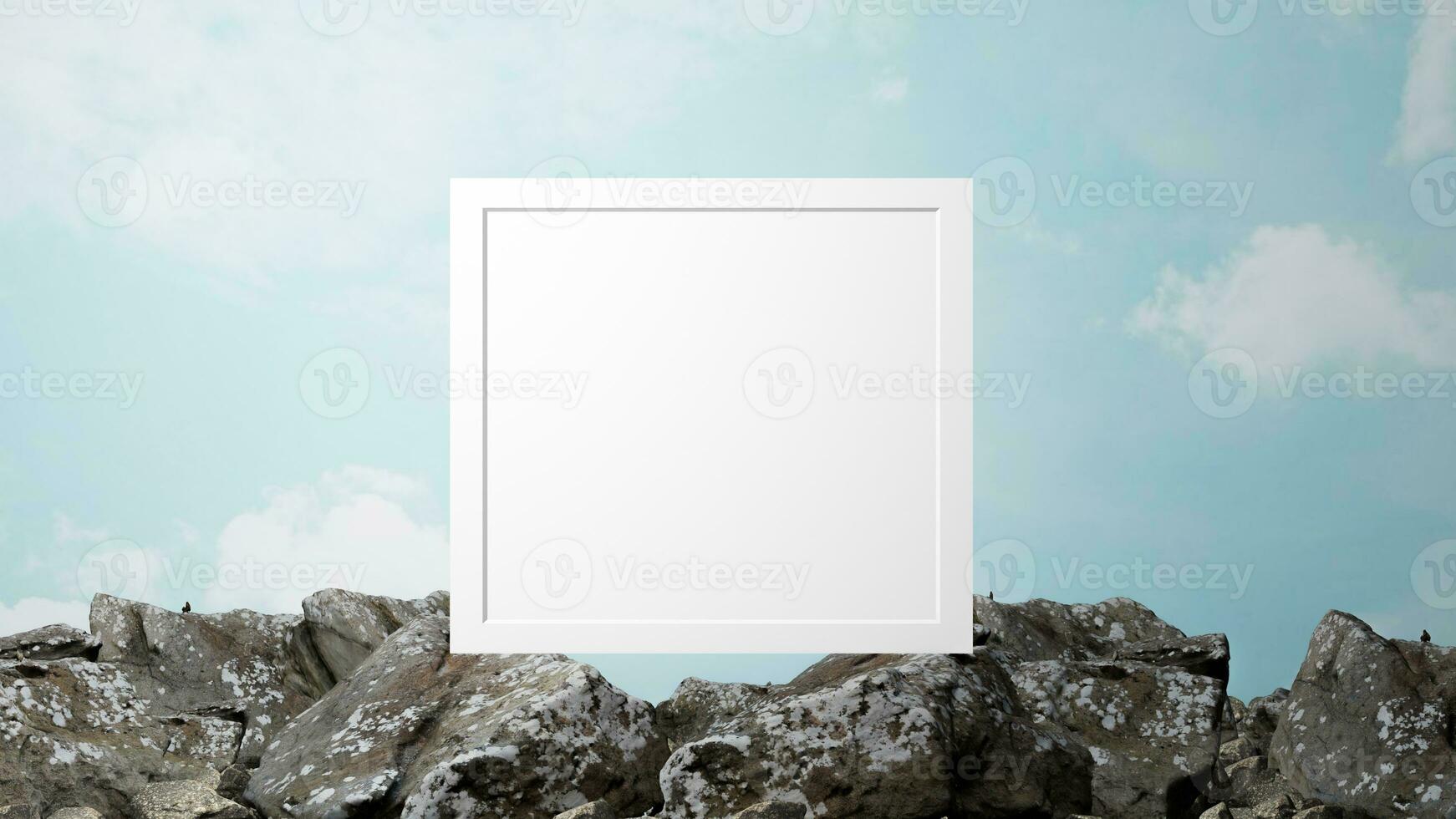 blank photo frame on rocks. sky background.