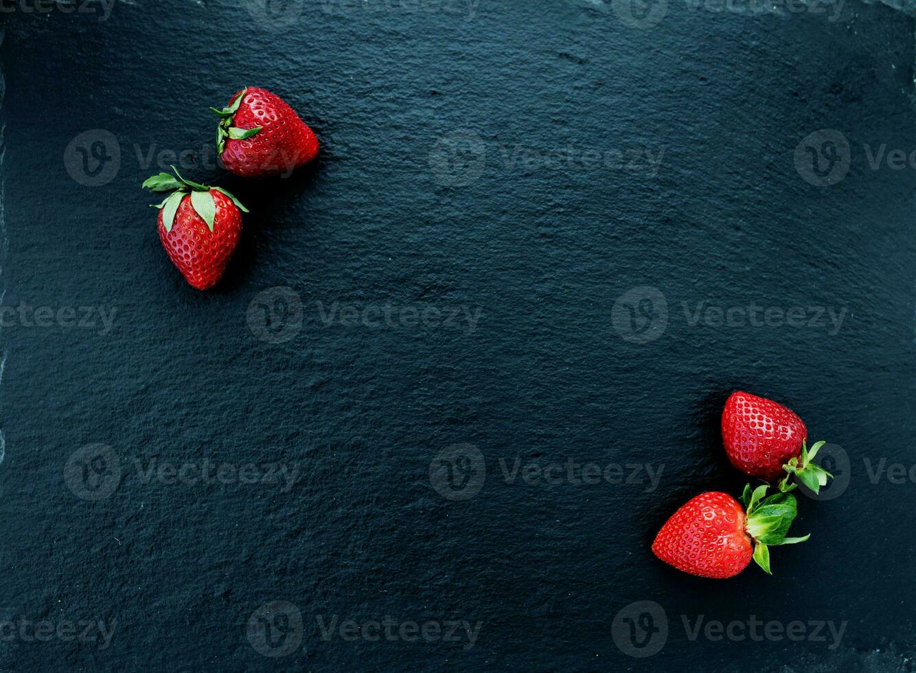 Summer still life with fresh juicy strawberries photo