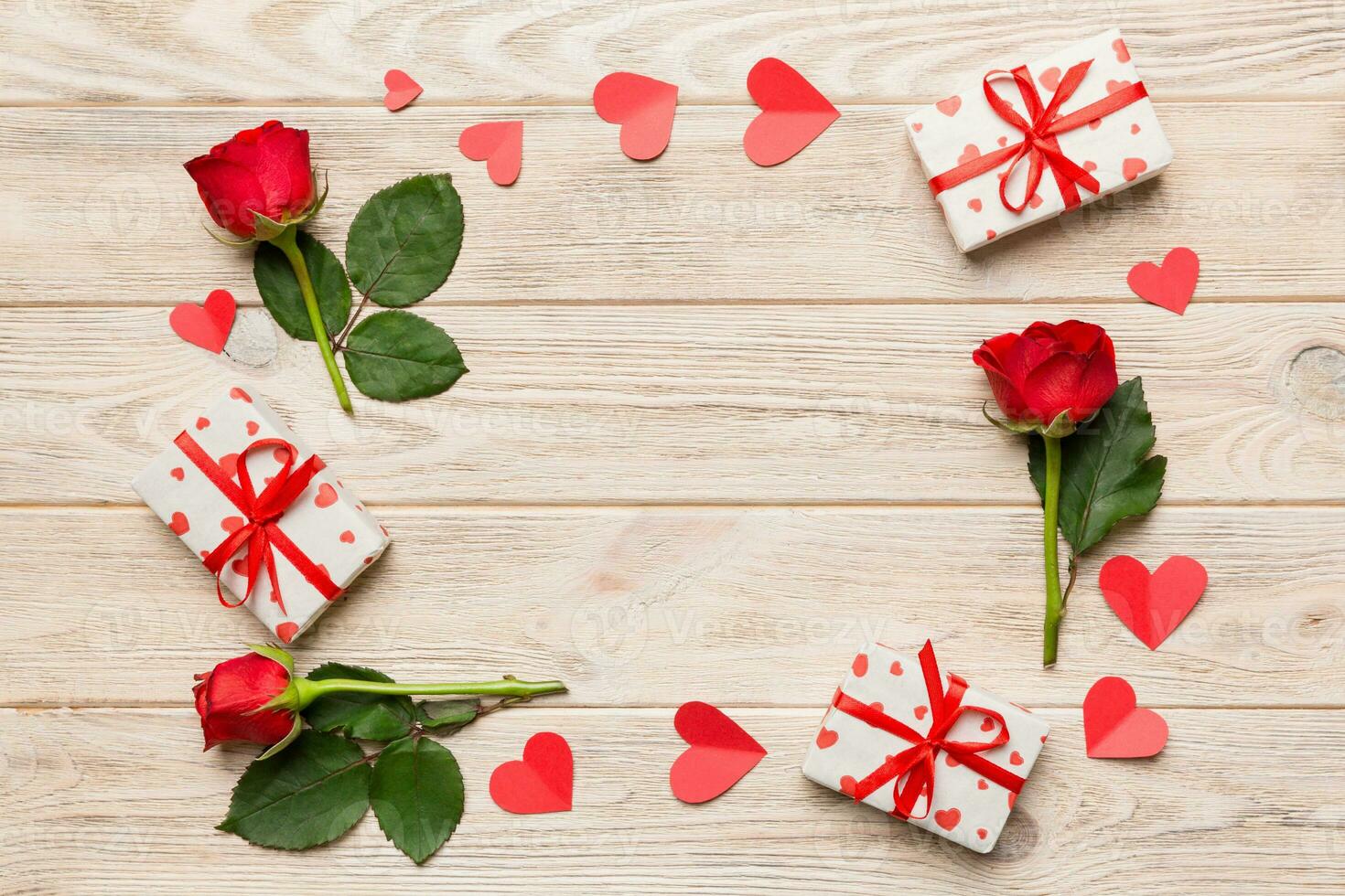 Heart made of rose, git box, heart and blank greeting card mockup on Colored background. Top view, flat lay, copy space Holiday, Mothers Day, birthday concept photo