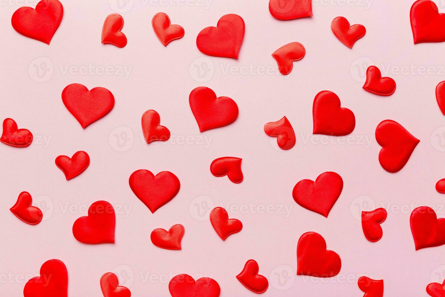 Valentine day background with red hearts, top view with copy space photo