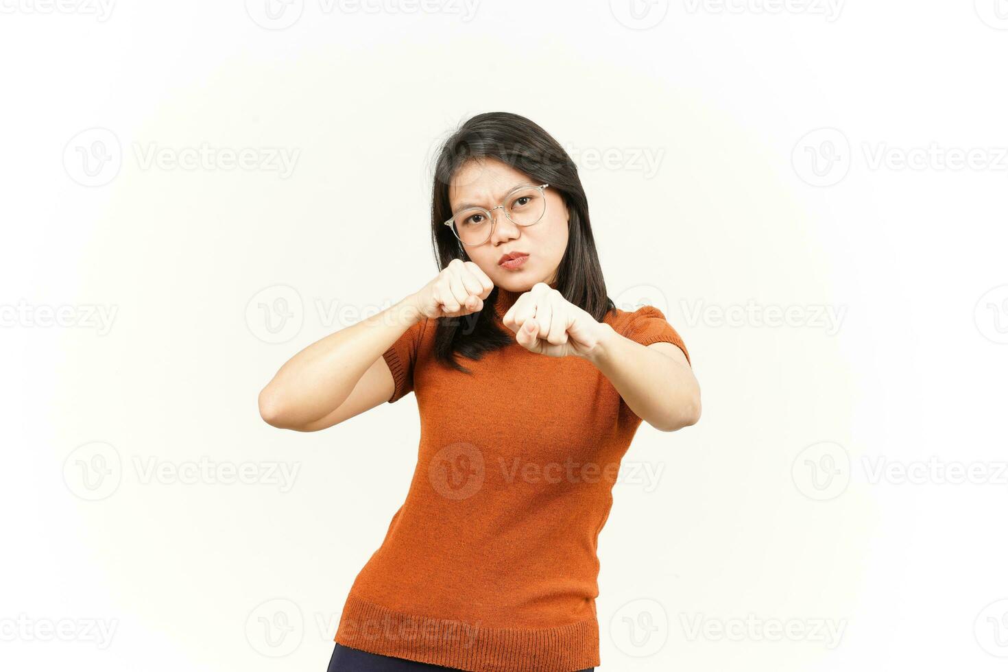 Punching fist to fight Of Beautiful Asian Woman Isolated On White Background photo