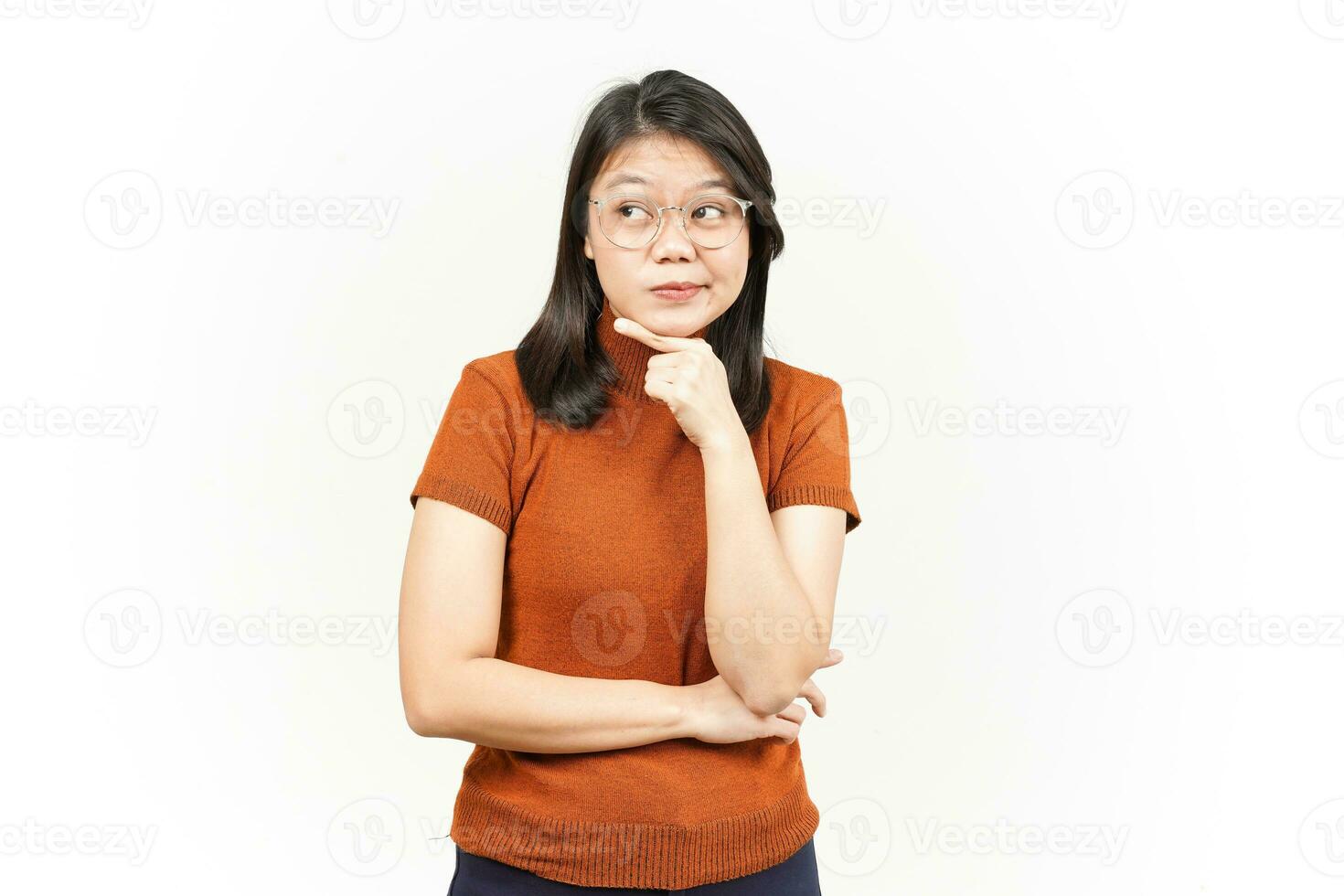 Thinking and Curious Face Of Beautiful Asian Woman Isolated On White Background photo