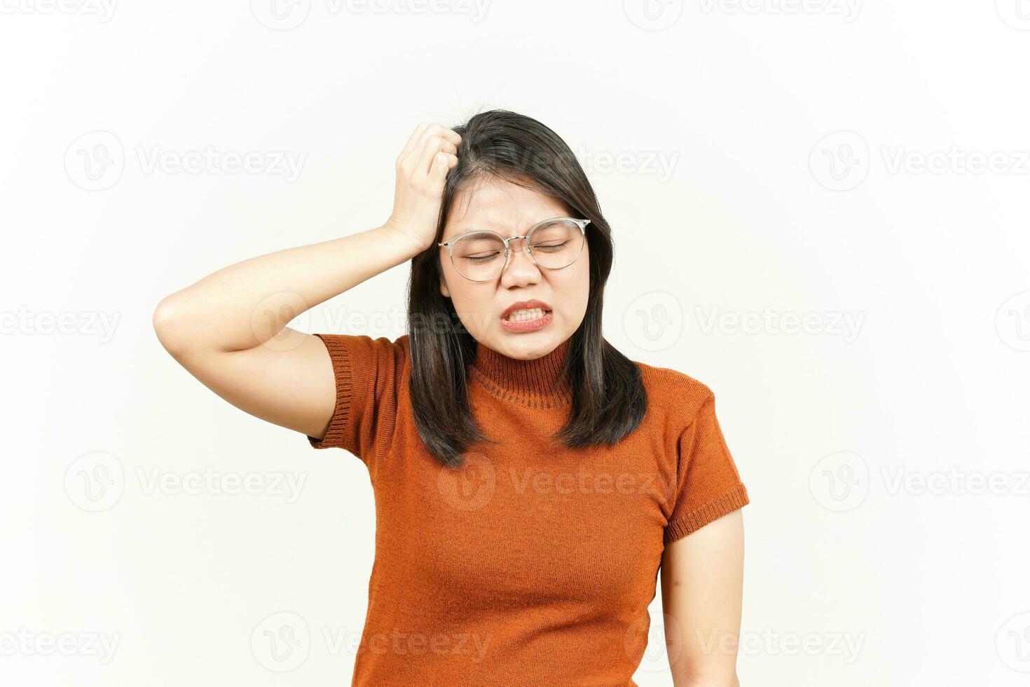 Suffering Headache Of Beautiful Asian Woman Isolated On White Background photo