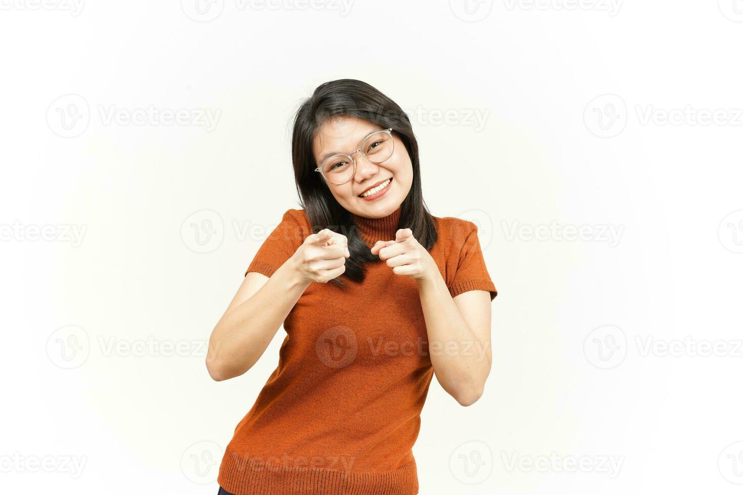 Smiling and Pointing at You, Want You Gesture Of Beautiful Asian Woman Isolated On White Background photo