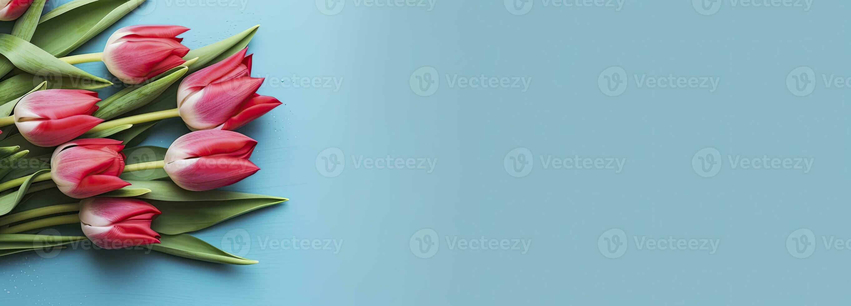 AI generated Bouquet of red tulip on blue Background. Top view with copy space.  AI Generated photo