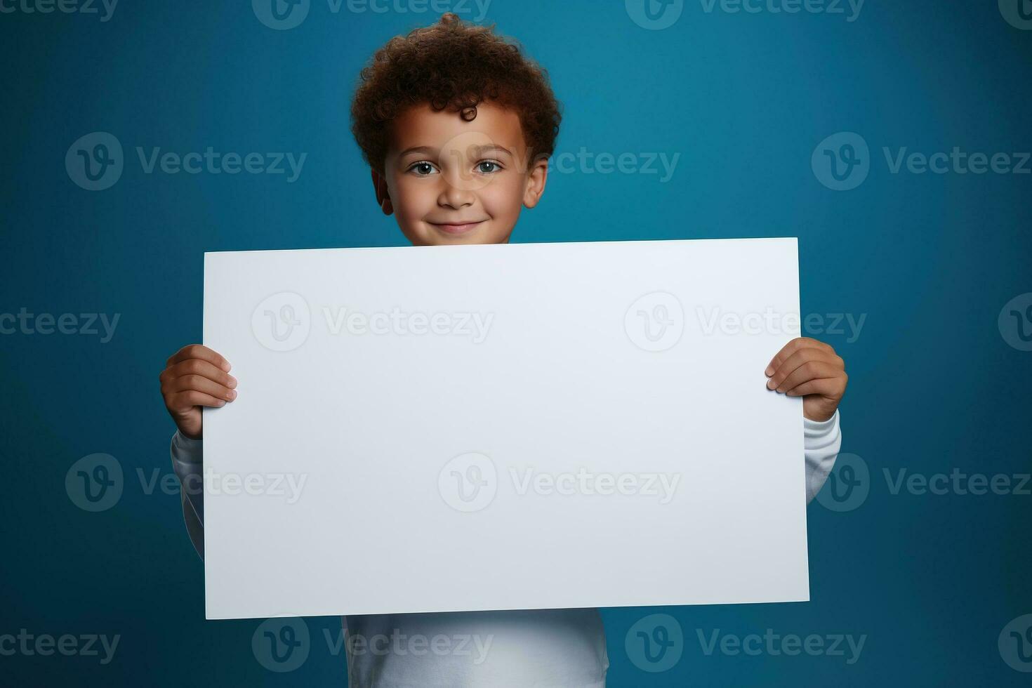 AI generated Little boy holding a blank white sheet of paper photo