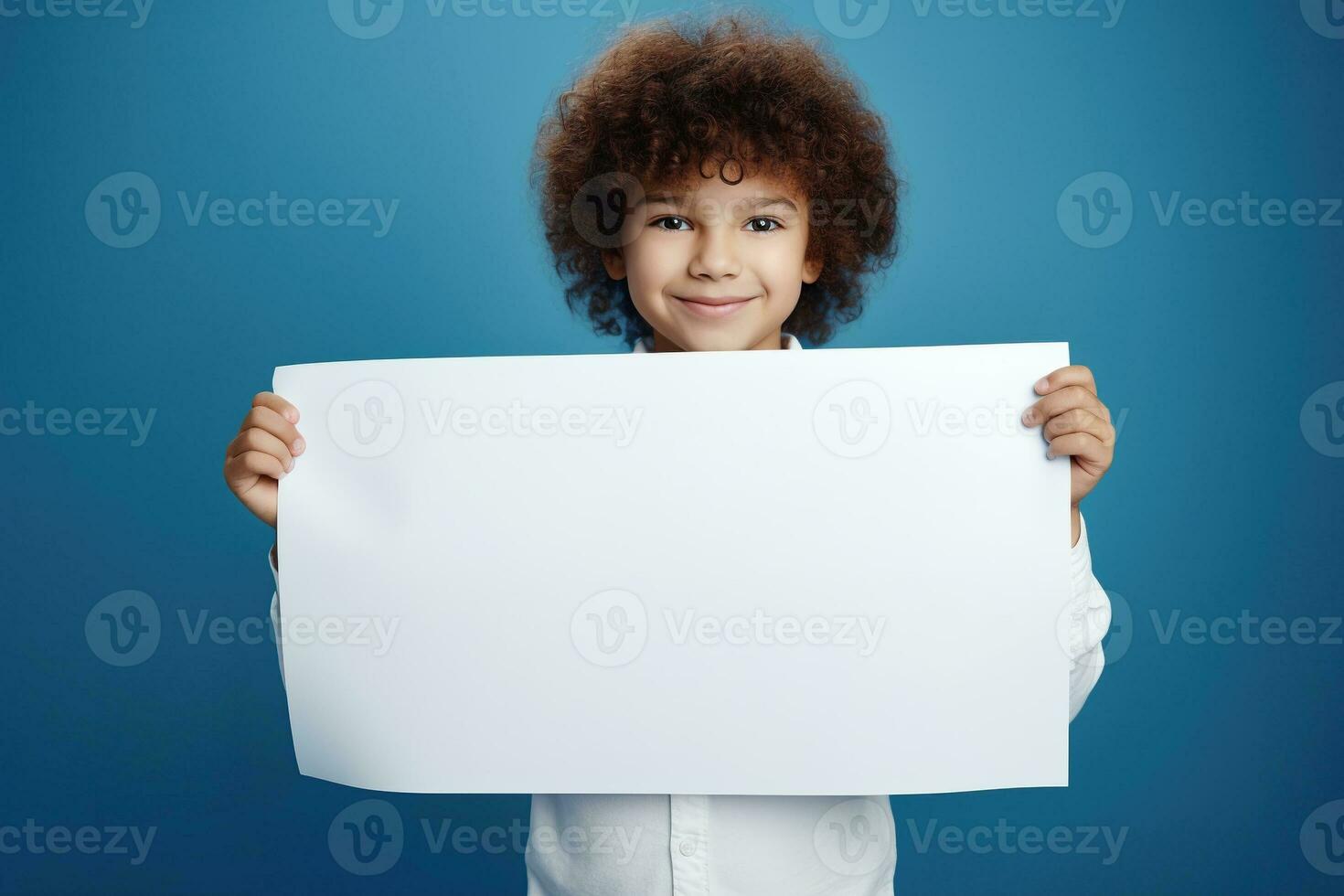 AI generated Little boy holding a blank white sheet of paper photo