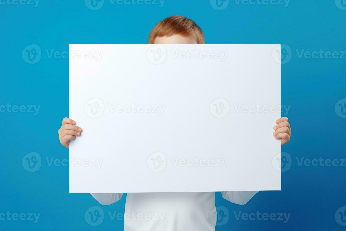 AI generated Little boy holding a blank white sheet of paper photo