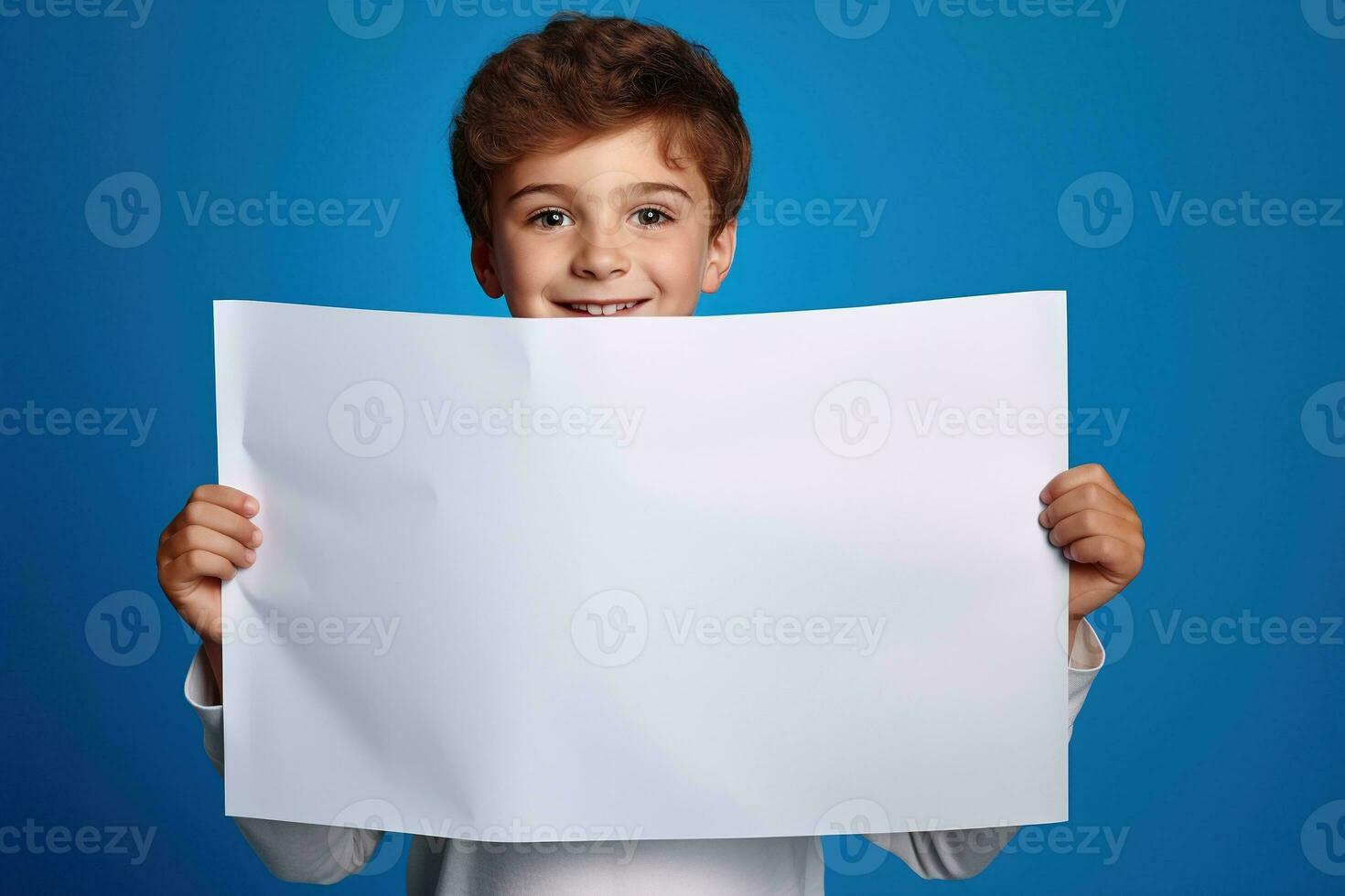 AI generated Little boy holding a blank white sheet of paper photo