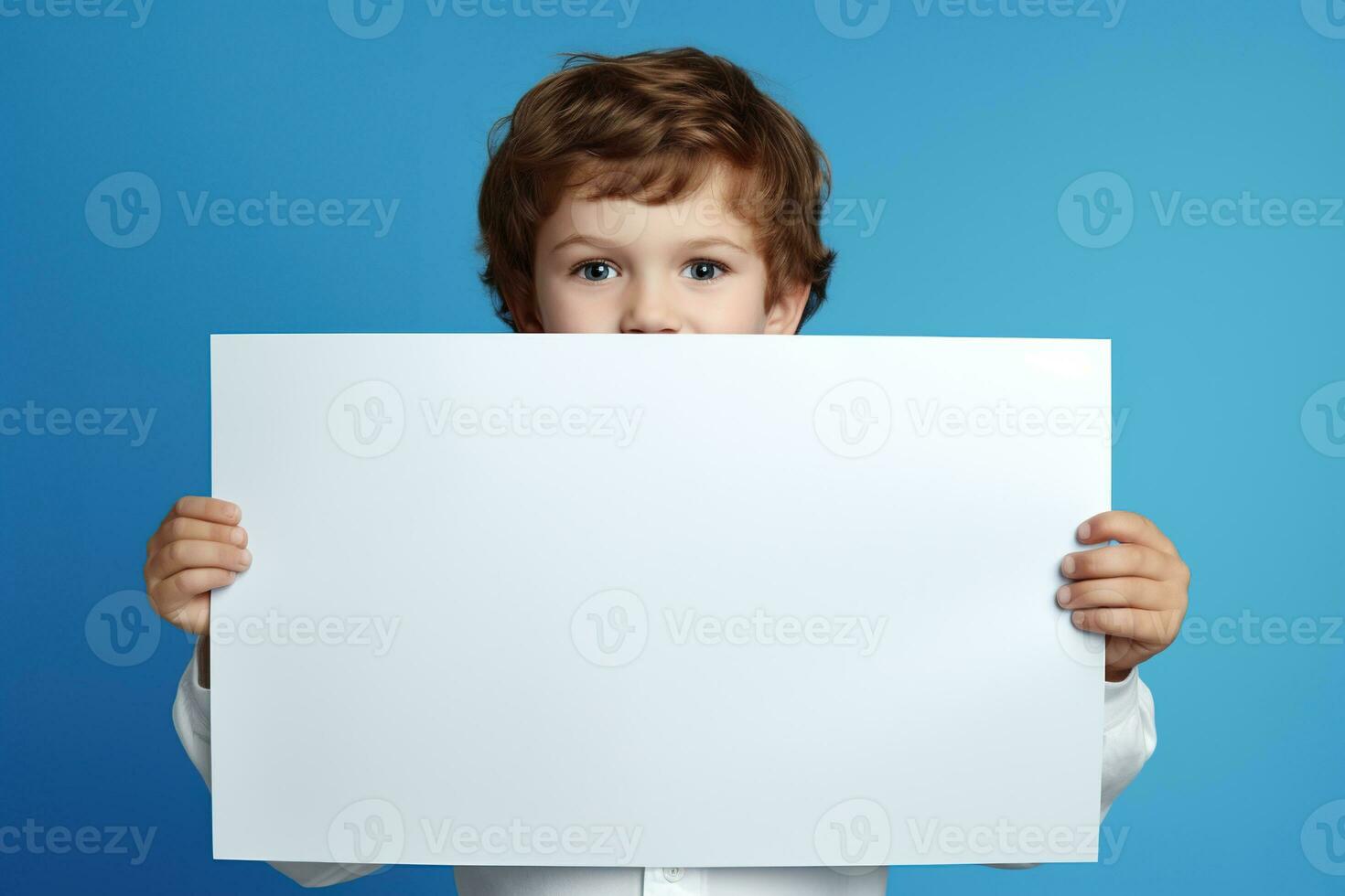 AI generated Little boy holding a blank white sheet of paper photo