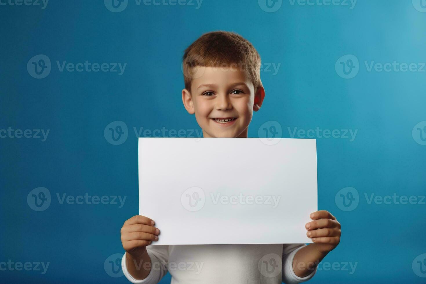 AI generated Little boy holding a blank white sheet of paper photo