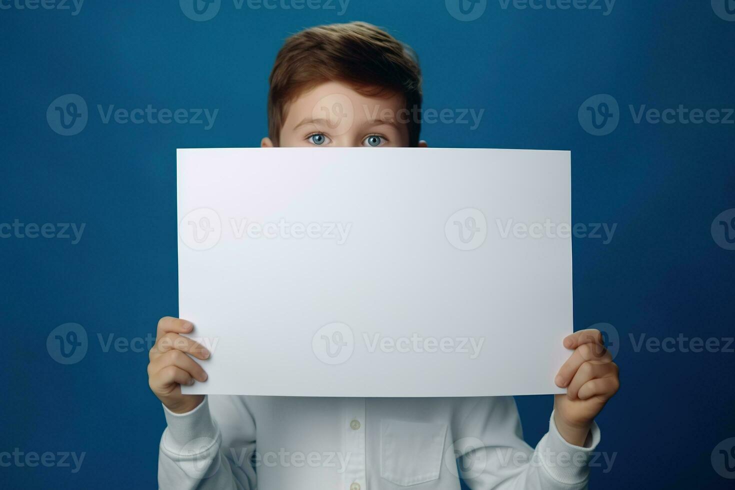 AI generated Little boy holding a blank white sheet of paper photo