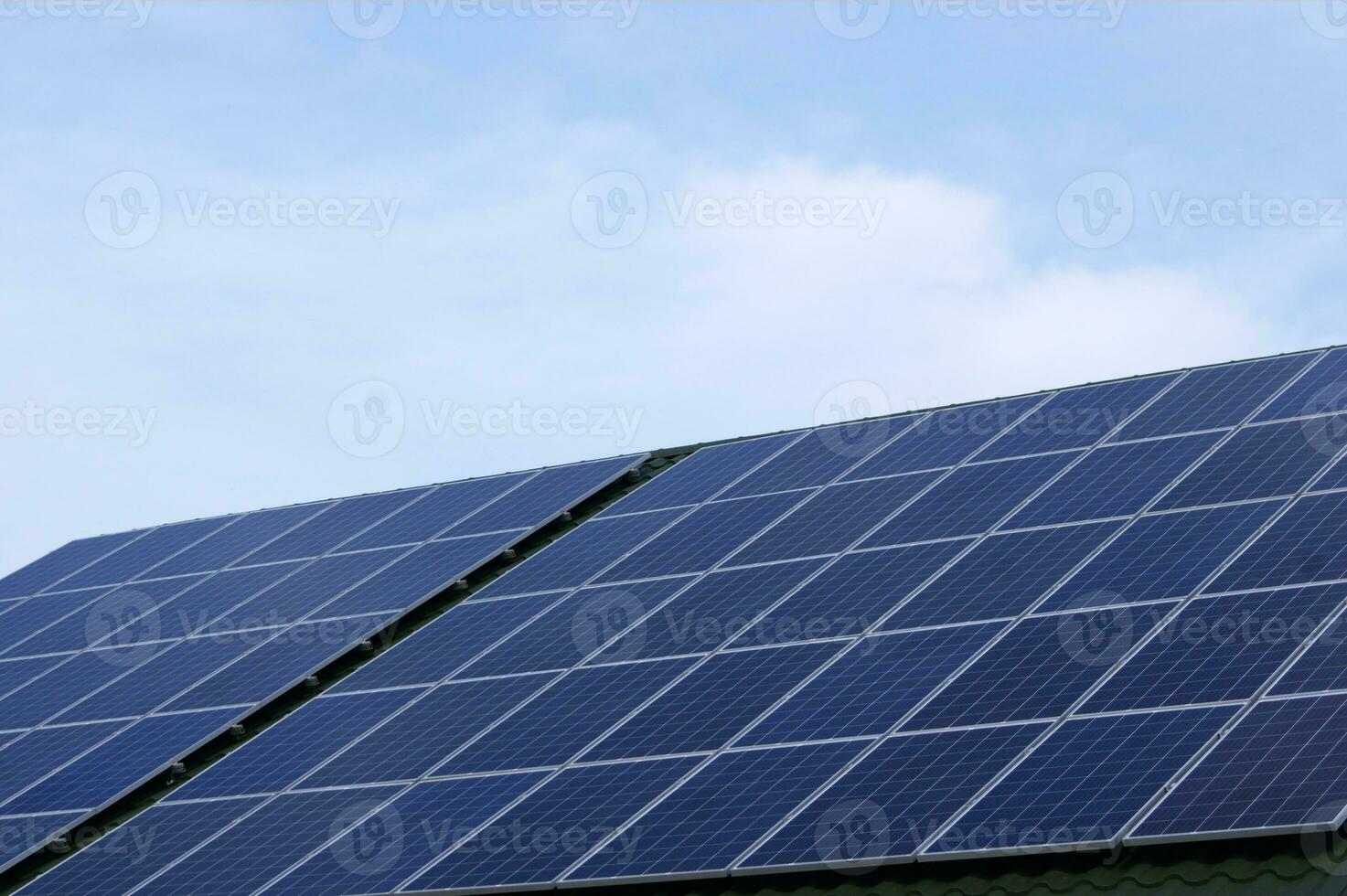 Solar panel on a green roof. photo