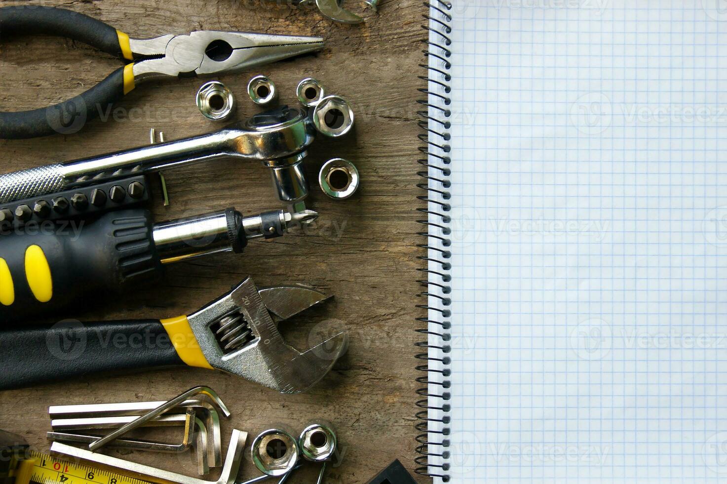 Working tools on wooden rustic background. photo
