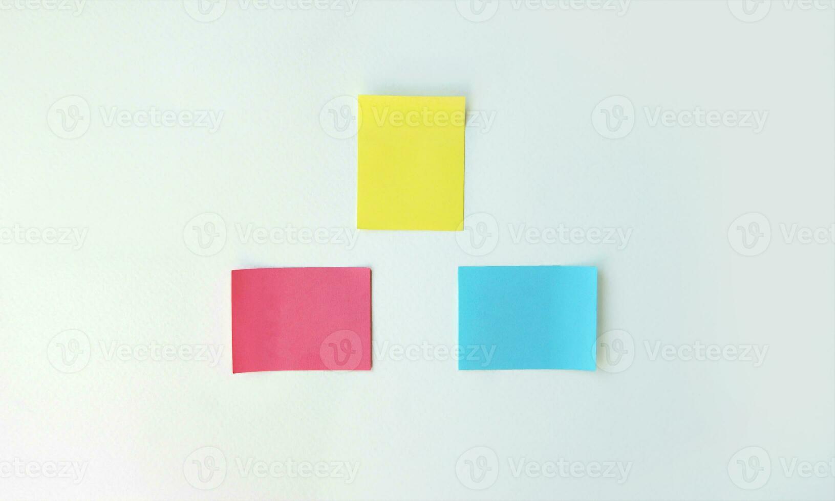 Empty space on multi colored office stickers. photo