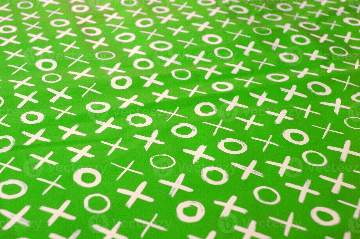 Expanded green wrapping paper with letters. photo