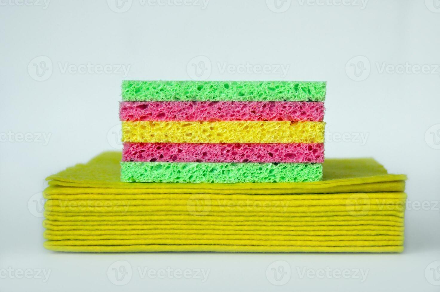 Bright colored sponges for washing dishes, cleaning the bathroom and other household needs. photo