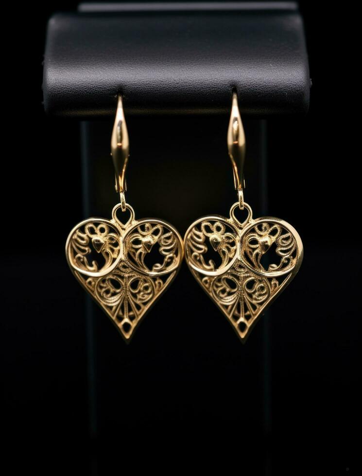 AI generated two gold earrings with intricate hearts design surrounded by lights, photo